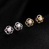 Pendientes de plata de ley 925 con forma de rosa y diamantes huecos para mujer, ligeros, lujosos, pequeños y exquisitos, con nicho que combina con todo.