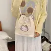 Bolso cruzado tipo cubo, bolso de hombro para estudiantes, bolso con temática de gato para mujer, nuevo bolso de 2026 para el trabajo, bolso de hombro de gran capacidad con lunares