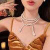 Colar elegante e moderno de clavícula de pérolas multicamadas, elegante e elegante, de luxo, com tendência europeia e americana simples