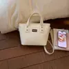 Bolso de Cuero en Relieve Vintage de Gama Alta para Mujer 2026 Nueva Moda Bolso Cruzado Versátil Bolso de Mano Súper Popular Bolso Tipo Cubo