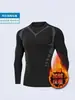 Camiseta de manga larga ajustada para hombre, estilo americano moderno, para otoño e invierno, con cuello redondo, diseño estampado, estilo deportivo casual y diseñada para acentuar los músculos, adecuada para correr y fitness