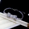 Pulsera Trendy de Zirconia Ultrabrillante de Doble Capa con Flor de Cuatro Hojas Europea y Americana, Joyería de Moda de Lujo Ligero de Nicho para Mujeres