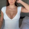 Ropa Europea y Americana 2025 Primavera y Verano Nuevo Color Puro Sexy Escote Profundo en V de Corte Bajo Manga Corta Casual Adelgazante Top para Mujer