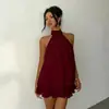 Vestido de color liso versátil, ajustado, de moda, sexy, sin espalda, cuello halter, con cinturón, para vacaciones transfronterizas europeas y americanas