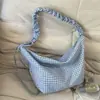 Bolso de cuadros transfronterizo para mujer, nuevo bolso de hombro casual de verano 2026 para la escuela y el trabajo, bolso cruzado tipo dumpling de gran capacidad