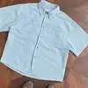 2026 Nova Camisa de Verão Azul Marinho com Xadrez Bolha de Manga Curta Unissex Versátil Solta Casual Estilo College
