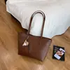 Bolsa Tote de Gran Capacidad para Mujer 2026 Primavera Nuevo Estilo Bolso de Mano Versátil de Alta Gama Hombro Único Axila Viaje Bolsa Grande