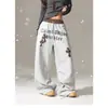 Comercio Transfronterizo Pantalones Deportivos Plisados Tipo Cimitarra con Estampado de Leopardo Patchwork Estilo Retro Americano para Mujer Otoño e Invierno Nuevo Diseño con Letras Sueltas