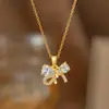 Nuevo Collar Colgante de Estrella con Lazo y Borla Estilo Hada Moda Femenina Simple de Gama Alta Lujo Ligero Cadena para Clavícula