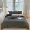 Nuevo juego de sábanas simple de cuatro piezas, funda de edredón, ropa de cama, funda de edredón de color liso, juego de tres piezas para cama de dormitorio de estudiante