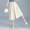 Calças cropped elegantes e fluidas de perna larga para mulheres, com um design inspirado na China, um visual jovial, cintura elástica com cordão e um efeito emagrecedor.