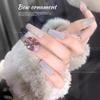 Nuevo diseño de uñas con diamantes, perlas y lazo, joyería con textura esmerilada, decoración tridimensional, accesorios para celebrar el Año Nuevo en Internet.