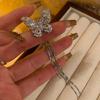 Clip para la oreja de borla de mariposa de circonita incrustada Moda Lujo ligero Aretes con sentido de alta gama Super hada de mujer Corea del Sur Ins Lote de aretes elegantes