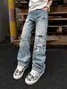 Marca de moda transfronteriza retro rasgados remaches modernos jeans de verano para hombre holgados estilo callejero pierna recta ancha hasta el suelo