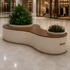 Combinación de asientos de caja de flores curva, banco de estanque de flores paisajístico para área de descanso de centro comercial, canaleta de flores para plantas verdes en espacio comercial interior