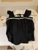 Wgwe8834 Ropa de Mujer Shisanxing de Guangzhou Primavera/Verano Nuevo Top Babydoll de Tirantes con Cuello Cuadrado y Adorno de Encaje