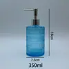 Botella dispensadora redonda de vidrio de 350 ml muy atractiva con cabezal de bomba para desinfectante de manos, gel de ducha y gel corporal