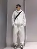 Cardigã MRNEARLY estilo americano com retalhos, corte justo, uma sweatshirt com capuz da moda para homens na primavera/outono
