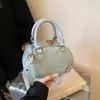 Bolso de Mano Simple y de Alta Gama Estilo Nuevo para Mujer Primavera 2026 Cuero Vintage con Cera de Aceite Bolso Bowling Elegante Bolso Cruzado