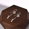 Pendientes de Plata Pura S999 Estilo Nuevo para Mujer, Pendientes de Borla de Flor con Sentido de Diseño Elegante, Ganchos de Pendientes de Lirio del Valle, Pendientes Sencillos