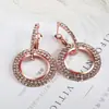 Brincos populares de strass moda criativa brincos de agulha de prata 925 temperamento feminino brincos de círculo oco geométricos E606