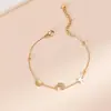 Nova Pulseira de Trevo de Quatro Folhas com Contas de Diamante e Elementos Múltiplos, Simples e Fashion, Dourada, de Nicho, Exquisite e Versátil, de Aço Titânio