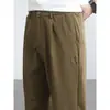 Pantalones cónicos elásticos de seda helada con sensación fresca para hombre, rebajas, novedad verano 2025, tejido gofrado, color liso, adelgazantes, de nueve puntos
