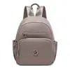 Bolso de hombro doble de nailon para mujer 2026 nuevo estilo moderno impermeable mochila para dama verano gran capacidad lona bolsa de viaje