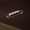 Colorido pasador de cintura con perlas y diamantes para ajustar la talla de la cintura de la ropa, accesorio de broche anti-exposición