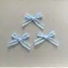 Nuevos Accesorios para el Cabello de Lazo Cruzado de Puntos Dulces Atado a Mano Funda para Teléfono Móvil Bolsa de Cinta Zapatos y Calcetines Accesorios de Ropa