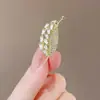 Broche novo estilo feminino senso de alta qualidade nicho broche atacado pino de alta qualidade temperamento fixo roupas terno joia pérola