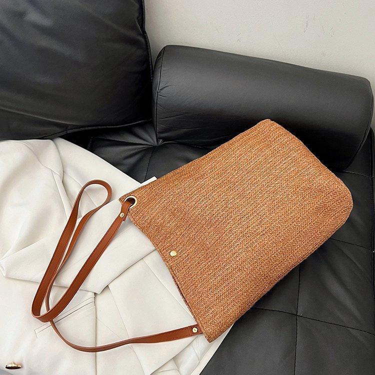 编织包女包新款潮2024夏草编简约百搭小清新水桶包个性单肩斜