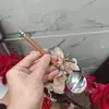 Cuchara redonda de imitación de palisandro, cuchara para arroz doméstica de acero inoxidable de alto valor con mango largo, cuchara de sopa estilo occidental retro con mango de plástico