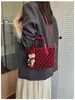 Bolso de lunares para mujer 2026 nuevo estilo moderno para salidas de verano tacto de alta gama para ir al trabajo bolso de un solo hombro bolso de gran capacidad para el antebrazo