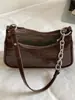 Bolso nuevo para mujer 2026, moderno y elegante, alto valor estético, bolso cuadrado pequeño, único y simple, color liso, bolso de hombro y cruzado, versión coreana