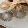 Pulsera Ancha Redonda Hueca de Metal de Venta Caliente Europea y Americana Brazalete Exagerado Único Sentido de Diseño de Moda Joyería de Mano de Nicho para Mujeres