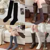 Calcetines cálidos de punto grueso retro gris para otoño e invierno para mujer, calcetines holgados de color liso simples con un toque juvenil, calcetines de media pantorrilla