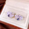 Pendientes de botón con forma de abanico de flor hueca de cristal de circonita cúbica de aguja de plata Pendientes simples, modernos, elegantes, de lujo ligero, nicho, accesorios de pendientes versátiles