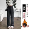 Pantalones de mujer de pierna ancha, holgados, a la moda y casuales, de cintura alta, con finas rayas, bolsillos y un diseño de pierna recta y fluido, hechos de terciopelo de algodón, para otoño e invierno 2026