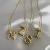 Amazon Xiyin colgante regordete moda europea y americana cadena de clavícula simple globo de cumpleaños collar de letra brillante