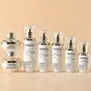Artículos de Stock con Veta Plateada Set Starlight Botella 30g Tarro de Vidrio para Crema 120ml Botella para Loción Productos de Empaque Cosmético Disponibles para Venta al por Mayor