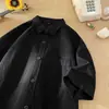 Marca de moda de alta calle americana Camisa de color liso de manga corta Primavera Top cómodo Juventud Simple Holgada Chaqueta casual Hombre