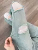 Jeans de Tiro Alto Rasgados Micro Acampanados para Mujer Primavera y Verano 2025 Nuevos Pantalones de Pierna Ancha Acampanados para Alargar la Figura con Borde Crudo hasta el Suelo