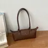 Bolso de axila para commuting transfronterizo para mujer, Nuevo modelo de verano 2026, Bolso de hombro simple de lujo ligero de nicho europeo y americano
