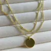 Joyería Europea y Americana Simple Doble Capa Apilada Disco Brillante Colgante Clip Perla Cadena Clavícula Collar para Mujer Fábrica Venta al por Mayor