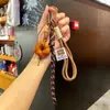 Miu Anillo de Llavero de Pan con Agua Alcalina Resina Pan Colgante de Llavero de Bolsa de Chocolate Regalo de Graduación