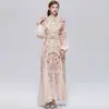 Foto Real de un Vestido Largo Estampado Vintage de Estilo Francés, Corte Ajustado, con Elegantes Mangas Abullonadas y Cinturón