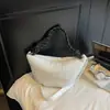 Bolso Bandolera Impermeable de Nailon Tipo Dumpling para Mujer 2026 Nuevo Estilo Ligero Acolchado Pequeño Bolso de Hombro Bolso de Mano Nicho Sensación de Alta Gama