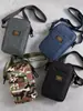 Mini Bolso para Teléfono Móvil de Hombre Lona Casual Bolso Pequeño de Hombro Moderno Versátil Portátil Bolso de Hombro para Herramientas de Moda Bolso Cruzado de Tendencia