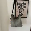 2026 Verano Nueva Bolsa Tejida Bolsa de Paja para Vacaciones en la Playa con Textura Relajada y Sensación Elegante Bolso Tote Bolso de Hombro Moderno
